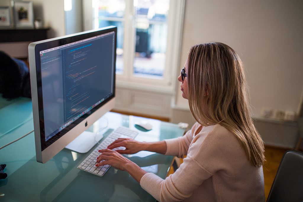 women working on laptop